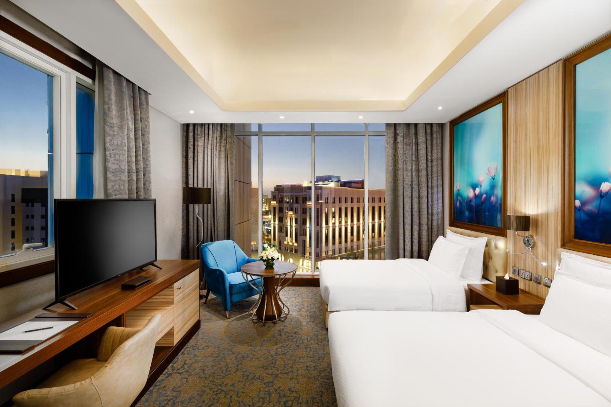 Millennium Place Doha Bagian luar foto Deluxe Room