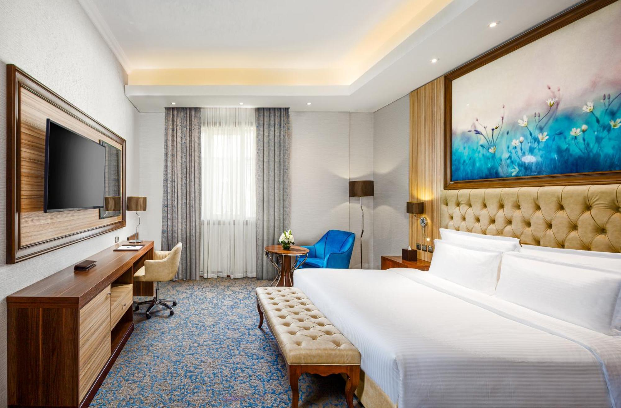Millennium Place Doha Bagian luar foto Deluxe Room