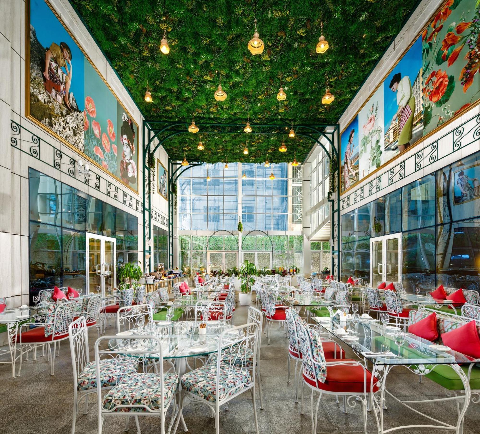 Millennium Place Doha Bagian luar foto The interior of the restaurant