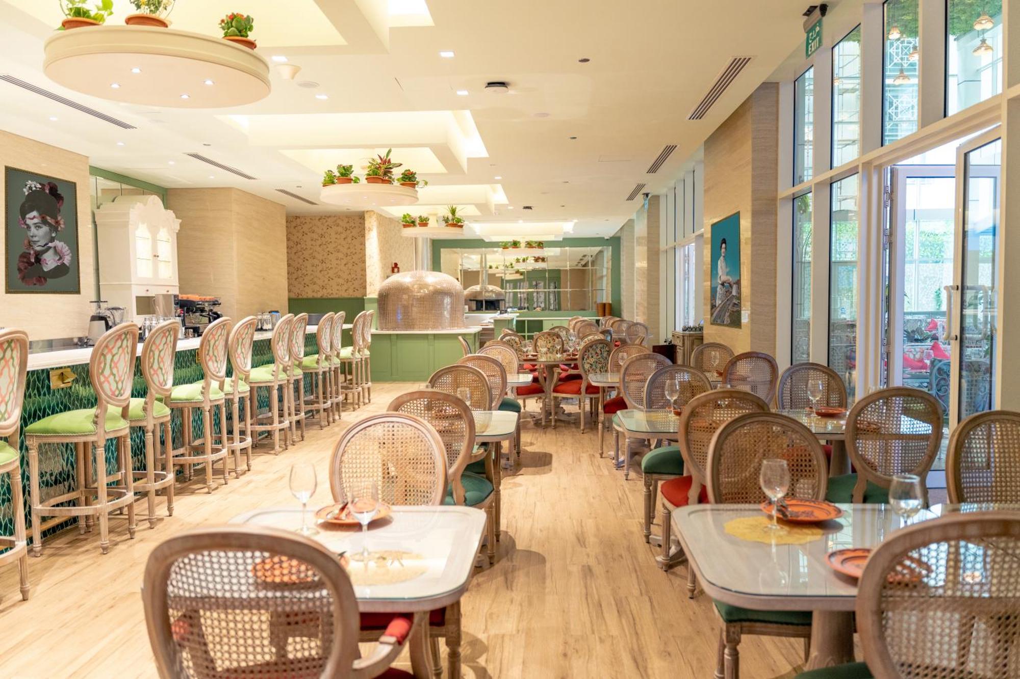 Millennium Place Doha Bagian luar foto The interior of the restaurant