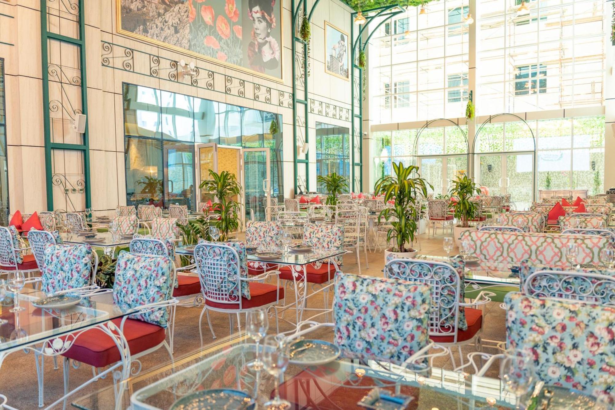 Millennium Place Doha Bagian luar foto The interior of the restaurant