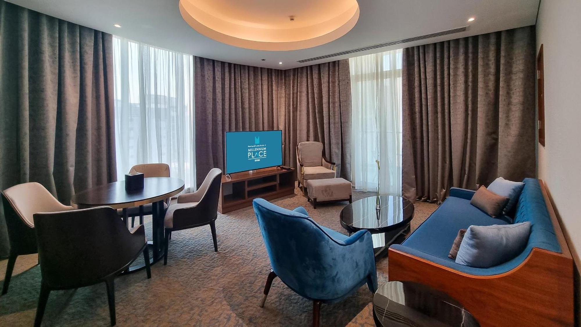 Millennium Place Doha Bagian luar foto A suite at the hotel