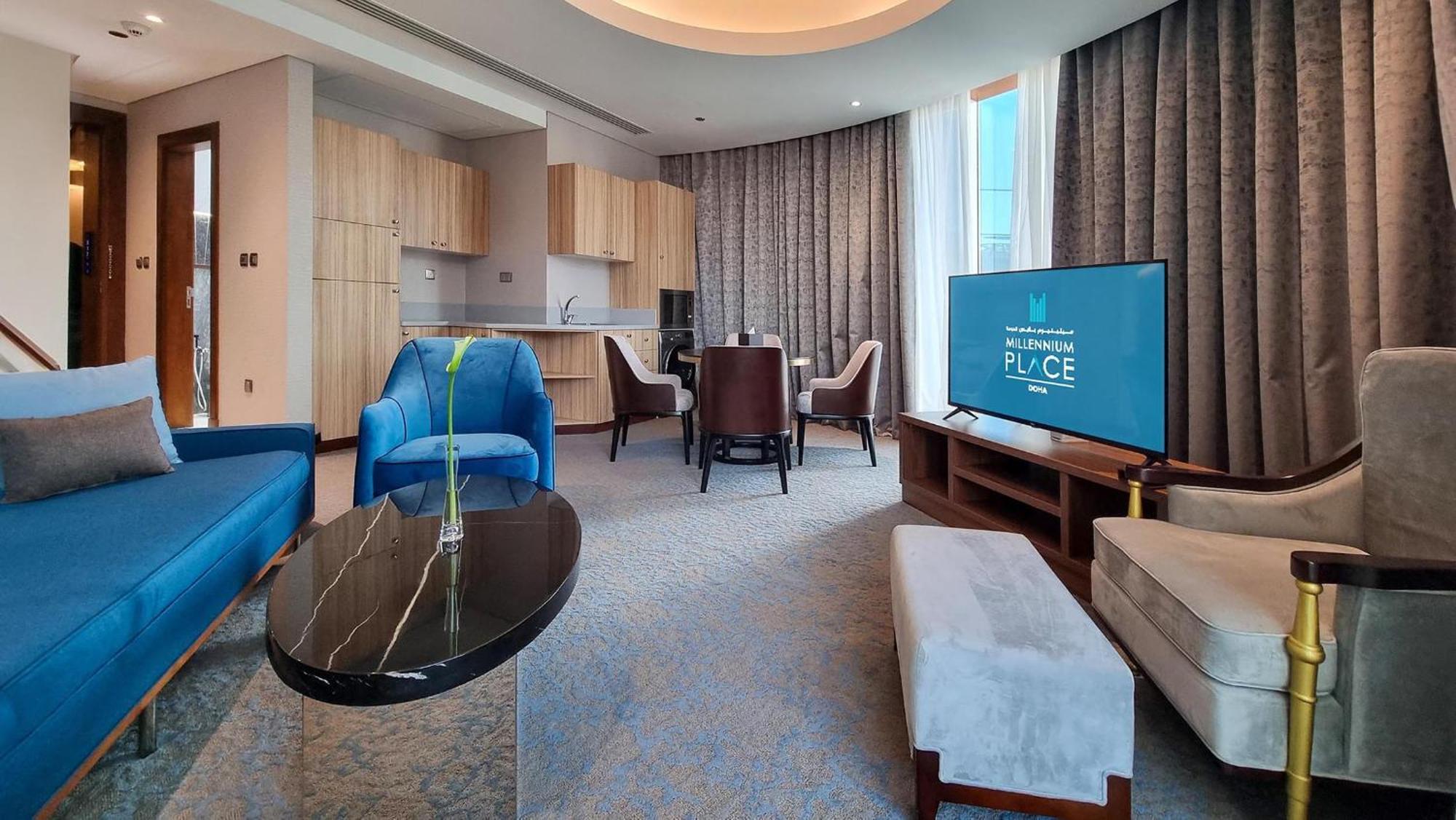 Millennium Place Doha Bagian luar foto A suite at the hotel